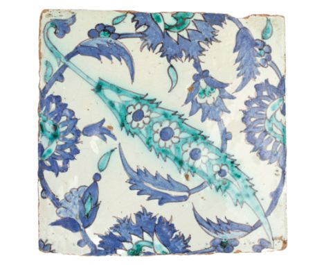 A near square Damascus pottery tile, Ottoman provinces, 18th century, the aubergine, blue and turquoise blue painted decorati