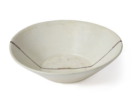 Property from a Private CollectionTo Be Sold with No ReserveA large Nishapur or Samarqand calligraphic pottery bowl, Eastern 