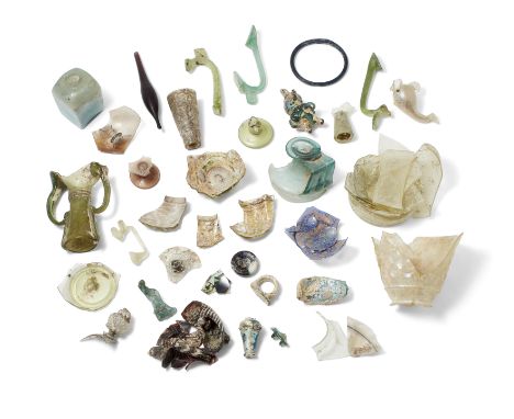 Property from a Private CollectionTo Be Sold with No ReserveA miscellaneous group of fragmentary glass from vessels and a dar