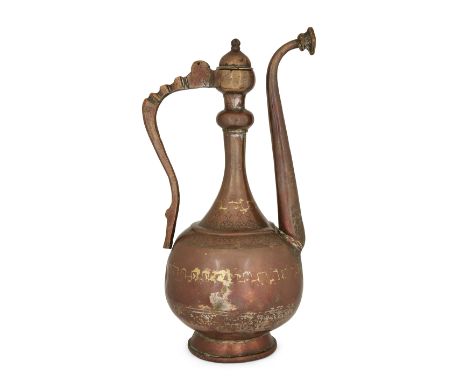 To be sold with no reserveAn engraved copper lidded ewer, North India, 17th century, on a slightly flared ring foot, the glob