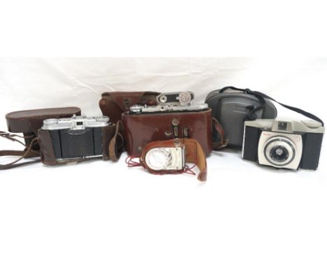 SELECTION OF CAMERAS
including a Balda folding camera, cased; a Voigkandier Vito II folding camera, cased; a Kodak 44B Browni