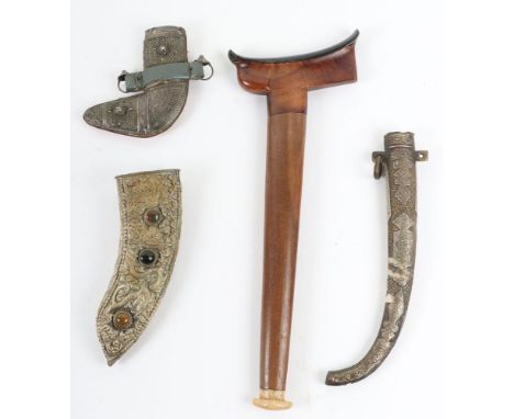 Eastern Dagger Scabbards: Wood Kris scabbard 35 cms long, metal Jambiya and two others. 4 items 