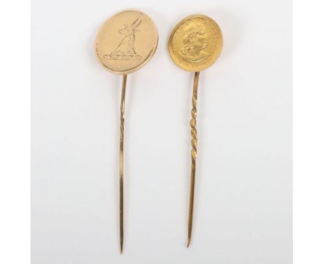 Two gold stick pins including a Peru 1911 1/5 Libra coin (.917) mounted on pin and a 9ct gold heraldic badge on pin, both on 