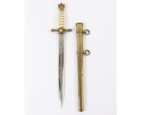 WW2 Germane Kriegsmarine Dagger: A good copy with etched blade with maker WKC ,complete with brass scabbard