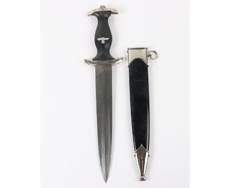 WW2 German SS Mans Dagger: A good vintage copy dagger with RZM and inscription to blade ,complete with scabbard