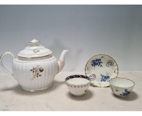 An 18th Century Caughley Teapot and Cover painted by Robert Chamberlain, ribbed design with sprays of flowers, an 18th Centur