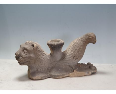 An antique stone Carving of a lion and a bird, 13in W