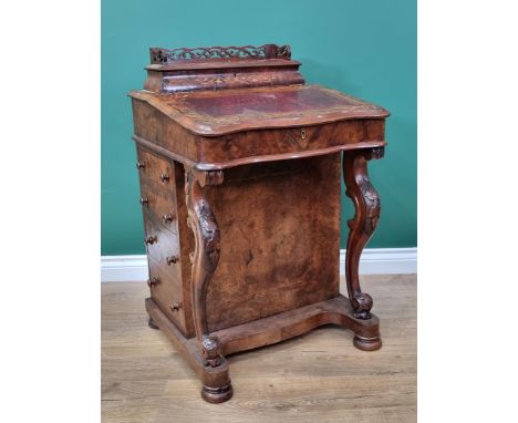 A Victorian walnut and floral marquetry Davenport Desk with raised hinged back, fitted interior and fitted drawers to the sid
