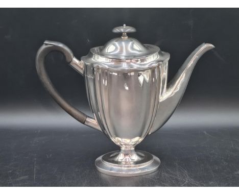 A George V silver oval Coffee Pot with reeded rim, Sheffield 1914, maker: Wm Hutton &amp; Sons, 690gms all in