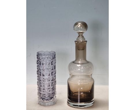 A Whitefriars textured "Aztec" Vase designed by Geoffrey Baxter, 7in high, and a Caithness smokey grey Decanter &amp; Stopper