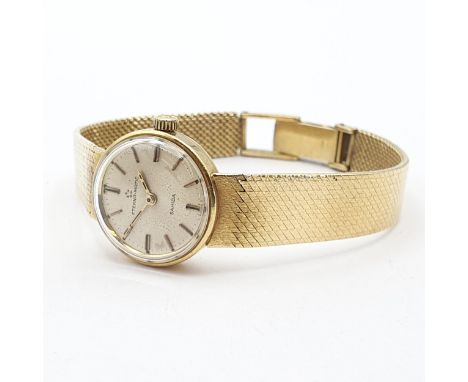A lady's Eterna-Matic Wristwatch the round silvered dial with hourly baton markers, case width approx 21mm on integral flat w