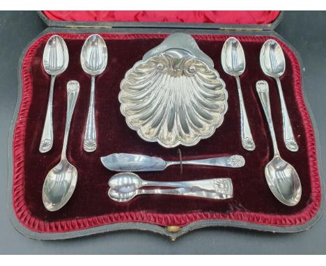 An Edward VII silver Afternoon Tea Set of scallop dish, six shell pattern spoons, sugar tongs and butter knife, Sheffield 190