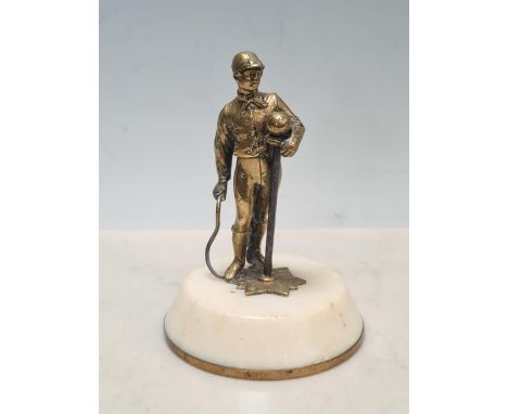 A Victorian bronze figure of a Jockey holding a whip, possibly French, on circular marble base, 6in H