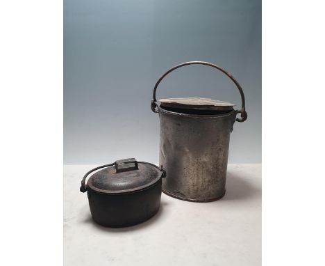An antique cast iron Cooking Pot 7in W and a Milk Churn 9in H (R6)