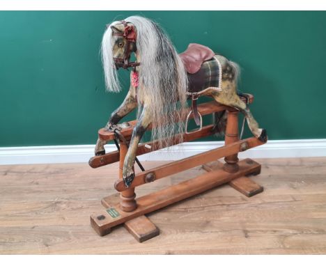 A 1920's G &amp; J&nbsp;Lines Brothers Sportiboy No 1,&nbsp;dapple grey Rocking Horse with grey horse hair mane raised on pin