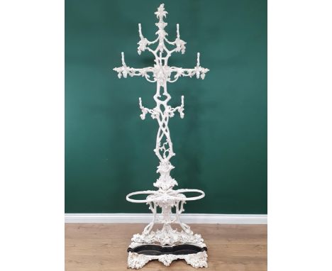 A Victorian white painted Coalbrookdale cast iron Hat and Coat Stand with naturalistic pierced design of leaves and branches,
