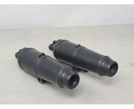 A vintage pair of Carronade Cannon, each 9in long, of heavily patinated bronze and finely made to the specification of the or