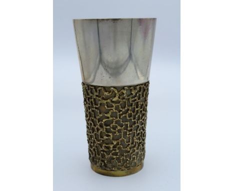 Stuart Devlin, an Elizabeth II silver gilt beaker, decorated with a broad textured band, 14cm, London 1969. 10.5 troy oz