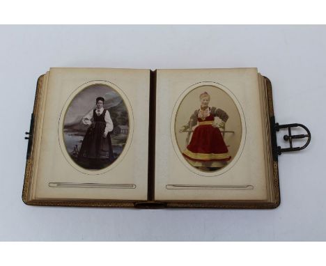 A late 19th century leather bound and tooled studio portrait photograph album containing thirty three photographs of Norwegia