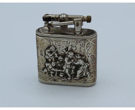 Karl Wieden, an early/ mid 20th century Continental silver cigarette lighter, embossed with the badge of the United Netherlan