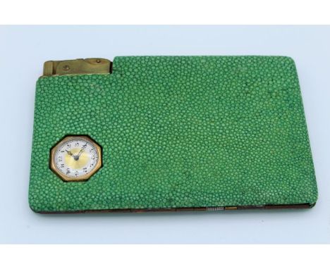 An early/ mid 20th century Austrian cigarette case/compact. Shagreen covered, with integral flint operated lighter and fob wa