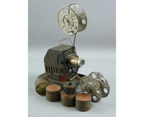 A BING BRITISH FILM PROJECTOR, tinplate hand cranked model, registered design no. 768644, with twin film spools and a small q