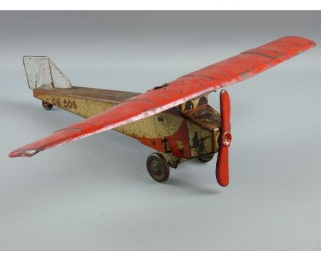 AN EARLY TINPLATE AIRPLANE, a single prop clockwork model, nicely lithographed with images of front gunners, no. C.R503 to th