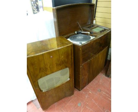 A VINTAGE DYNATRON RADIOGRAM & amplifier, a Berkeley walnut cased model with Thorens record deck on a slate base, tuner knobs