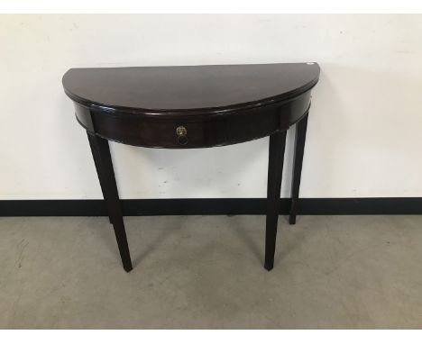 A late Georgian demi lune mahogany card table, 91cm wide, with frieze drawer