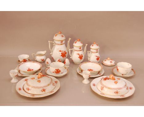 A two person Herend ceramic breakfast set, including two cups and saucers, two muffin plates with covers, two egg cups, two s