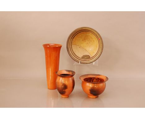 Four items of studio pottery, comprising two ceramic jars of differing sizes by David Henderson, together with a brown glazed