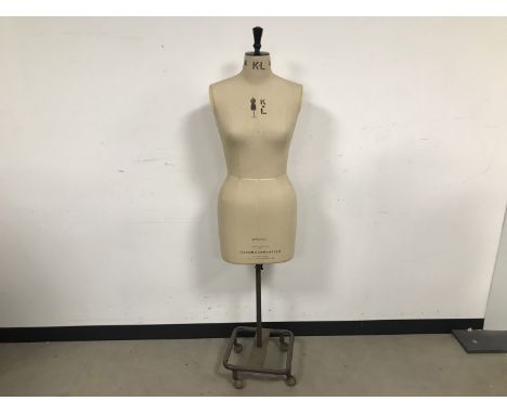 A second half 20th century mannequin from Kennett &amp; Lindsell Ltd, marked for size 16, on stand with wheels