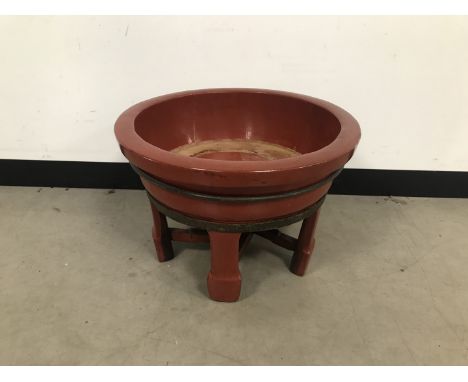 A vintage Chinese red lacquered planter, 54cm diameter