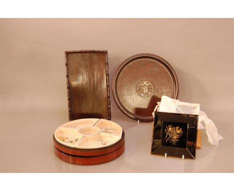 A selection of Oriental items, comprising two hardwood trays one circular with a jade central insert, the other rectangular, 