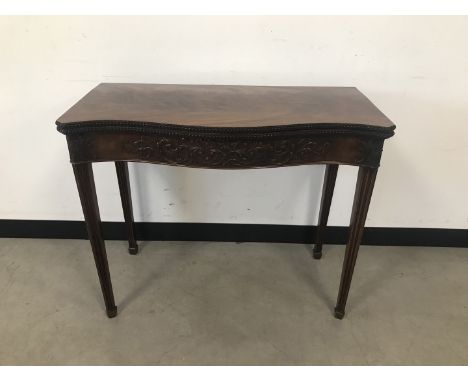 A Victorian Adam style mahogany card table, 90cm wide, with nice moulded frieze