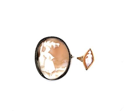 AN ANTIQUE CARVED SHELL CAMEO BROOCH DEPICTING A RURAL SCENE WITH MAIDEN, TOGETHER WITH A ANTIQUE CARVED SHELL CAMEO RING OF 