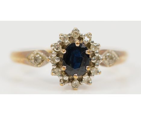 A 9ct gold sapphire and single cut diamond cluster ring, London 1989, J 1/2, 1.9g
