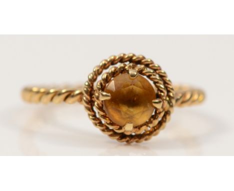 A 9ct gold citrine dress ring, twist rope band, J 1/2, 1.5g