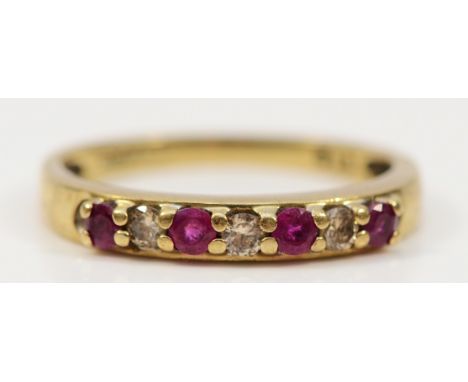 A 9ct gold ruby and brilliant cut diamond half eternity ring, N, 1.9g