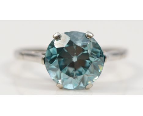 An 18ct white gold and platinum blue zircon solitaire ring, 10mm, Q, numbered on the inner band 3392, 3.6g
