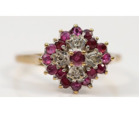 A 9ct gold diamond and ruby cluster ring, Birmingham 1985, O, 2.3g