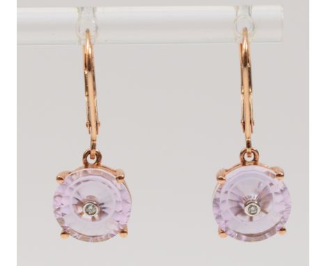 A pair of 9ct rose gold amethyst lever back earrings, with a diamond set into the middle of the amethyst, 10mm amethyst, 2.8g