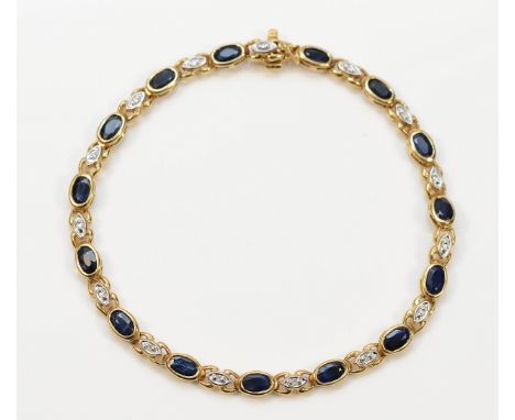 A 9ct gold blue and white gemstone bracelet, 18cm, 6.5g