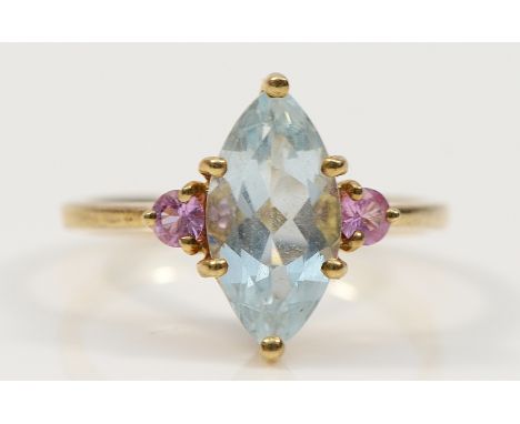 A 9ct gold three stone dress ring, multi gemstones, Q, possibly aquamarine and pink topaz, 2.9g