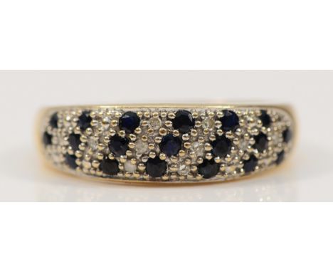 A 9ct gold sapphire and diamond three row dress ring, hallmarks worn, P 1/2, 2.4g