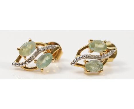 A pair of 9ct gold emerald and diamond earrings with scroll backs, 2g