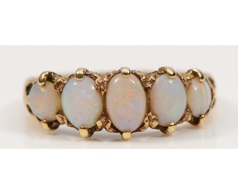 A 9ct gold opal five stone ring, J 1/2, 2.6g