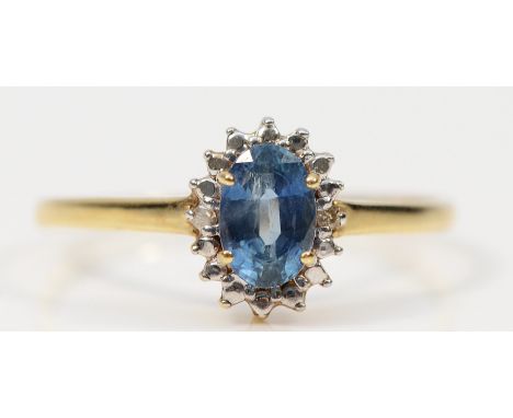 A 9ct gold aquamarine and diamond cluster ring, N, 1g