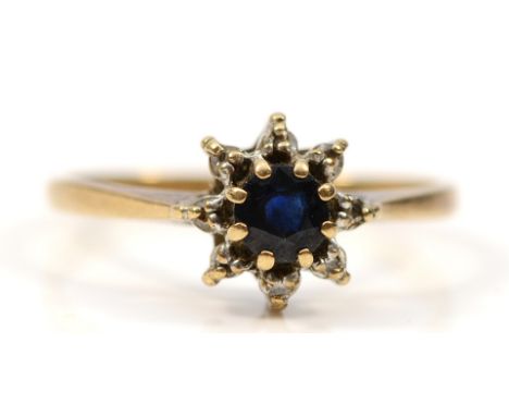 A 9ct gold diamond and sapphire cluster ring, K, 1.5g