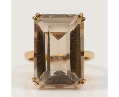 A 9ct gold smokey quartz cocktail ring, 19mm x 14mm quartz, O, 7.2g